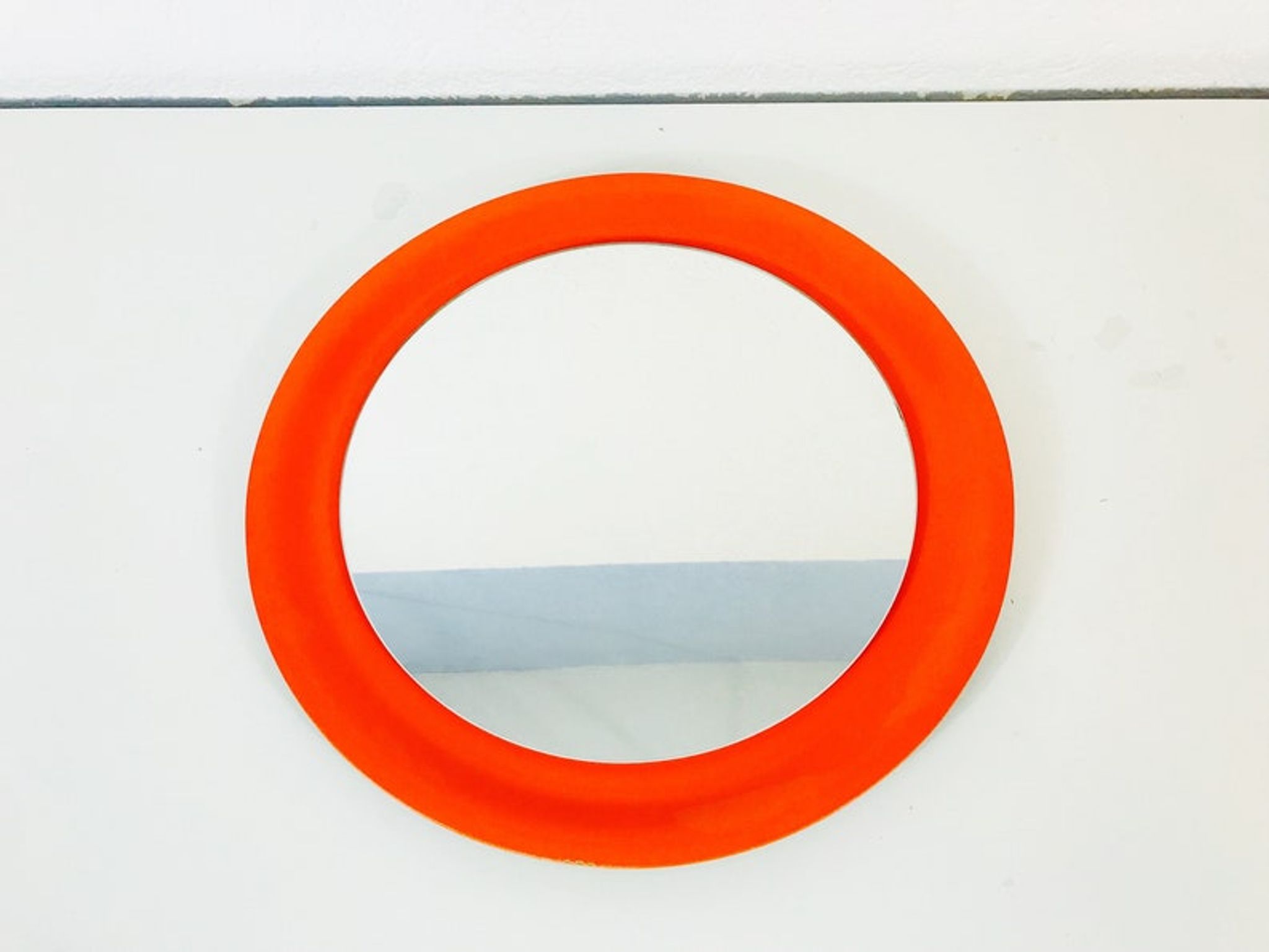 Red circular wall mirror 45x45cm Germany 1970s