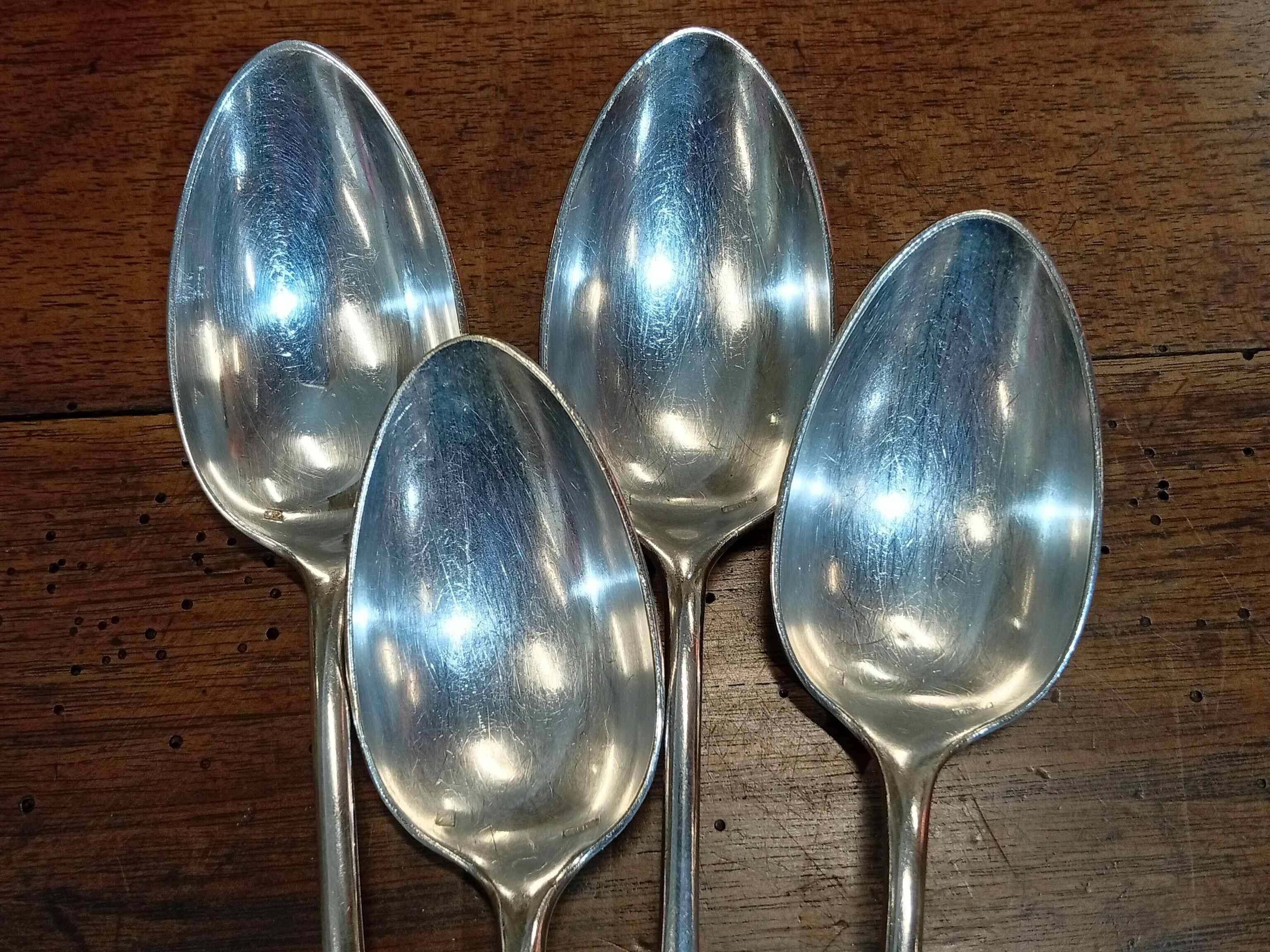 Set of 4 large spoons in the Vieux Paris style in silver-plated metal.