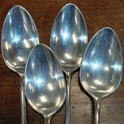 Set of 4 large spoons in the Vieux Paris style in silver-plated metal.
