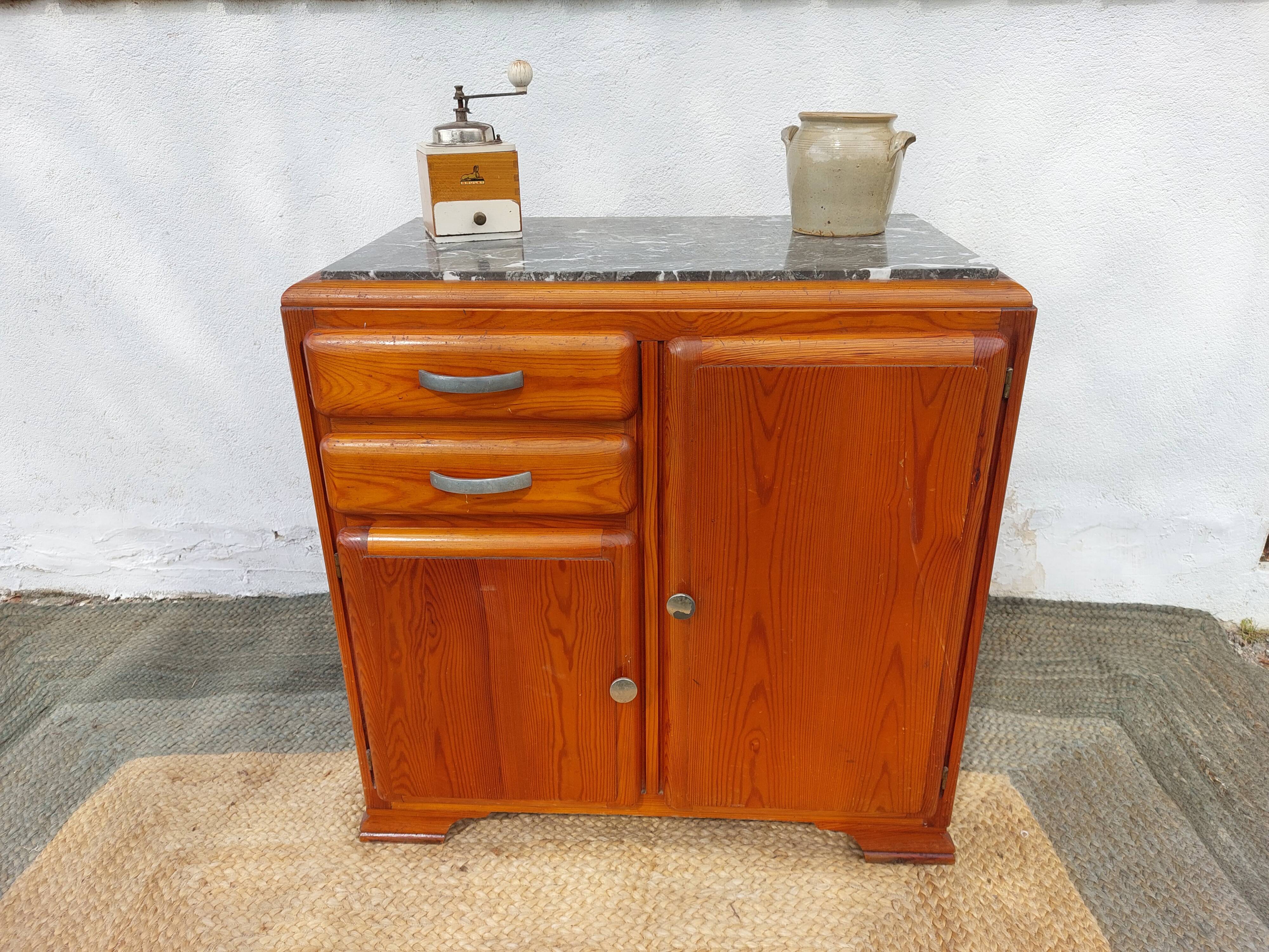 Mado buffet, marble top and asymmetrical doors.