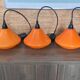 Set of three orange opaline suspensions from the 1970s Space Age.