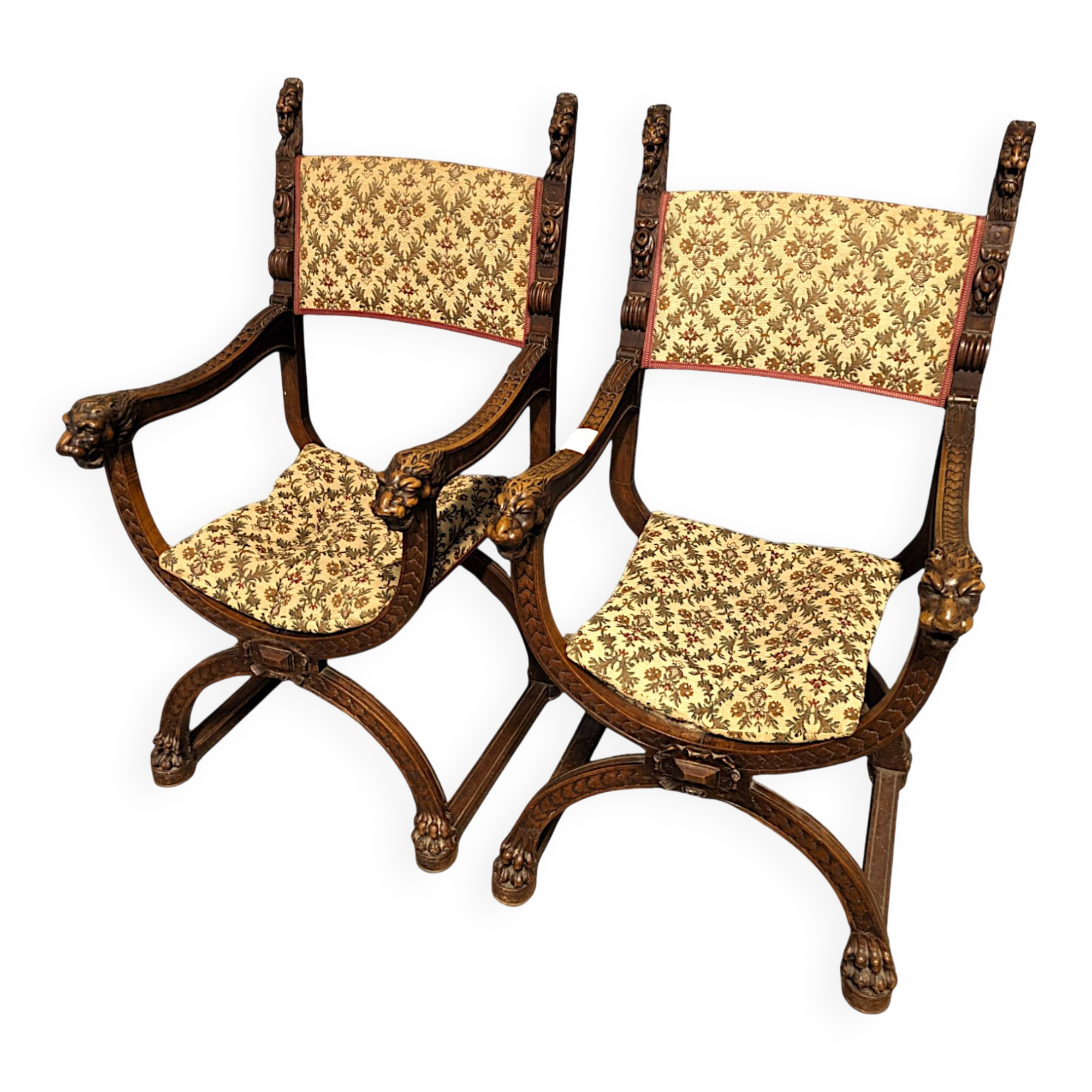 Pair of Renaissance style walnut armchairs