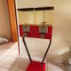 Old metal candy dispenser