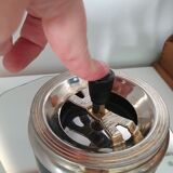 Pushing ashtray