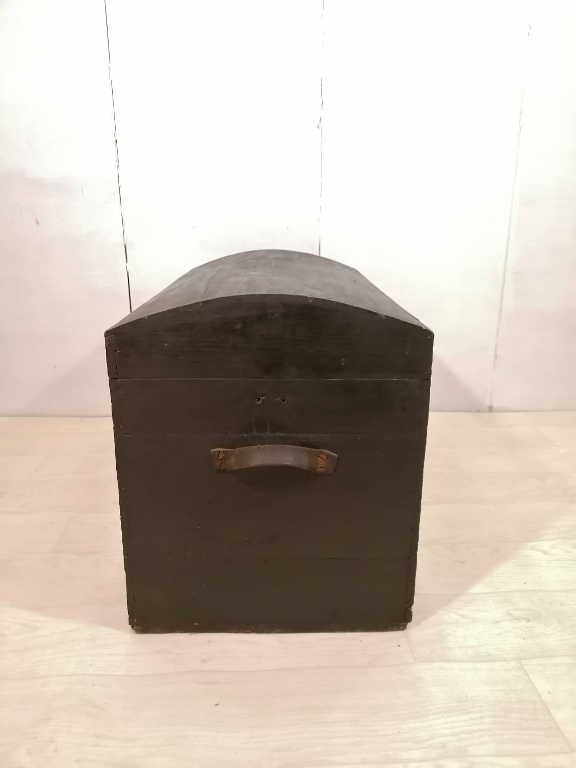 Large travel trunk in blackened wood