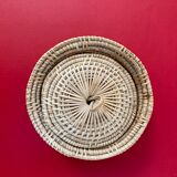 Vintage basket in braided rattan