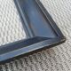 Old black patinated frame