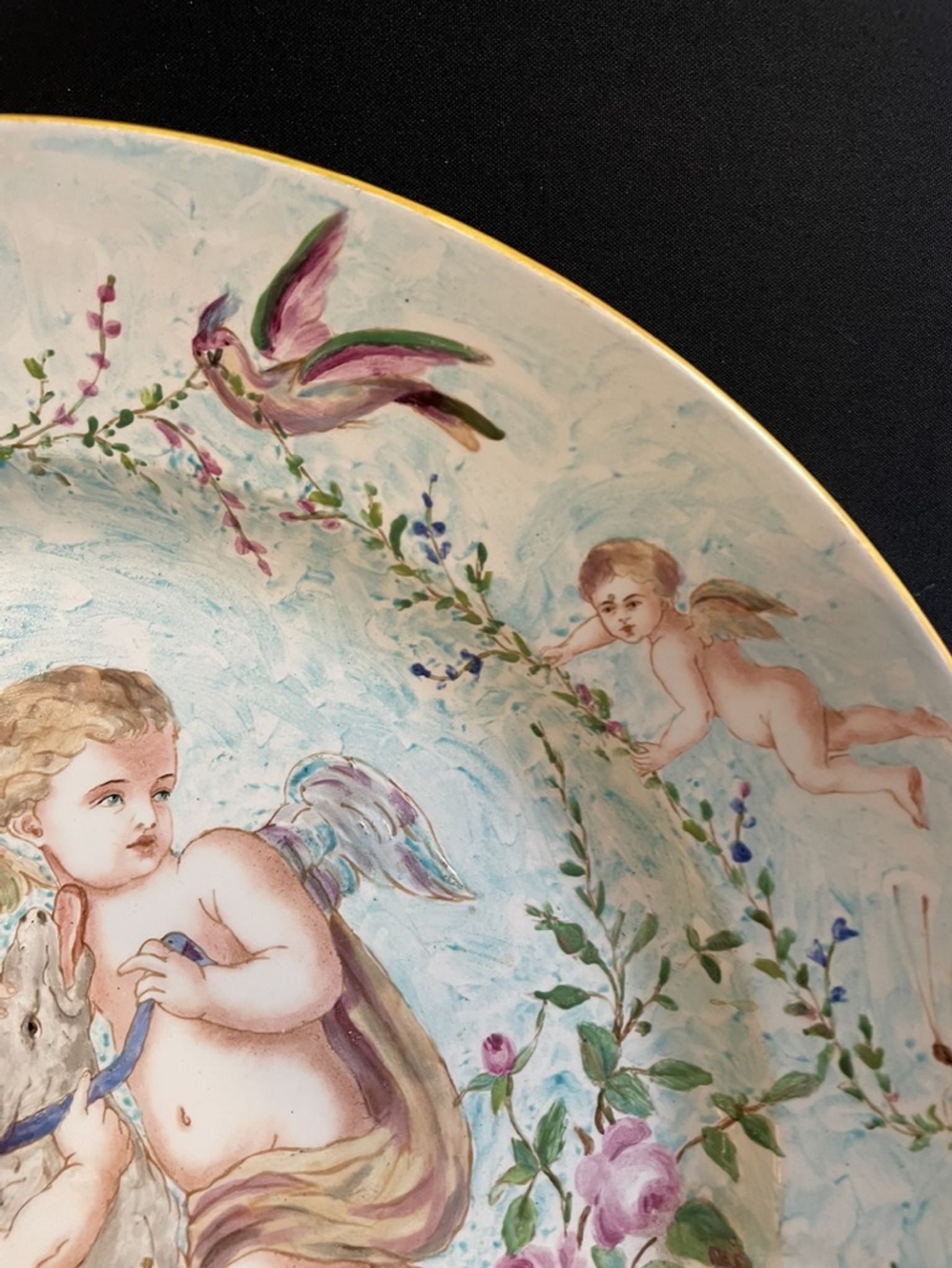 Round earthenware dish - hand decoration signed and marked