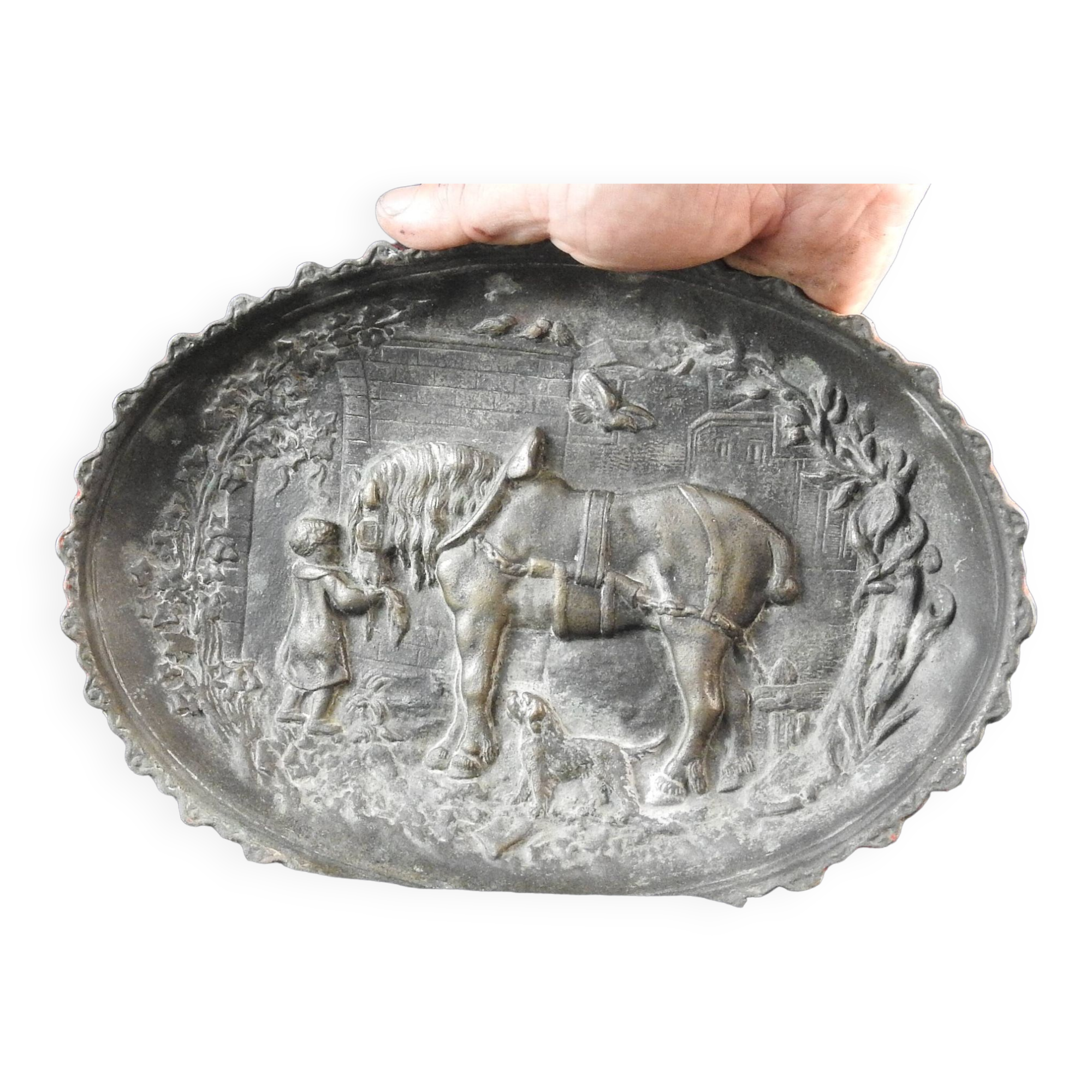 Bronze dish decorated with animals and children