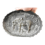 Bronze dish decorated with animals and children