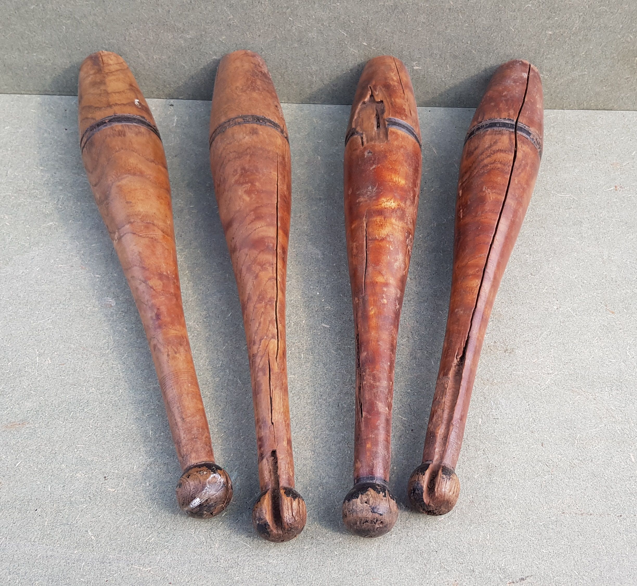 Set of 4 old English juggling clubs circa late 19th