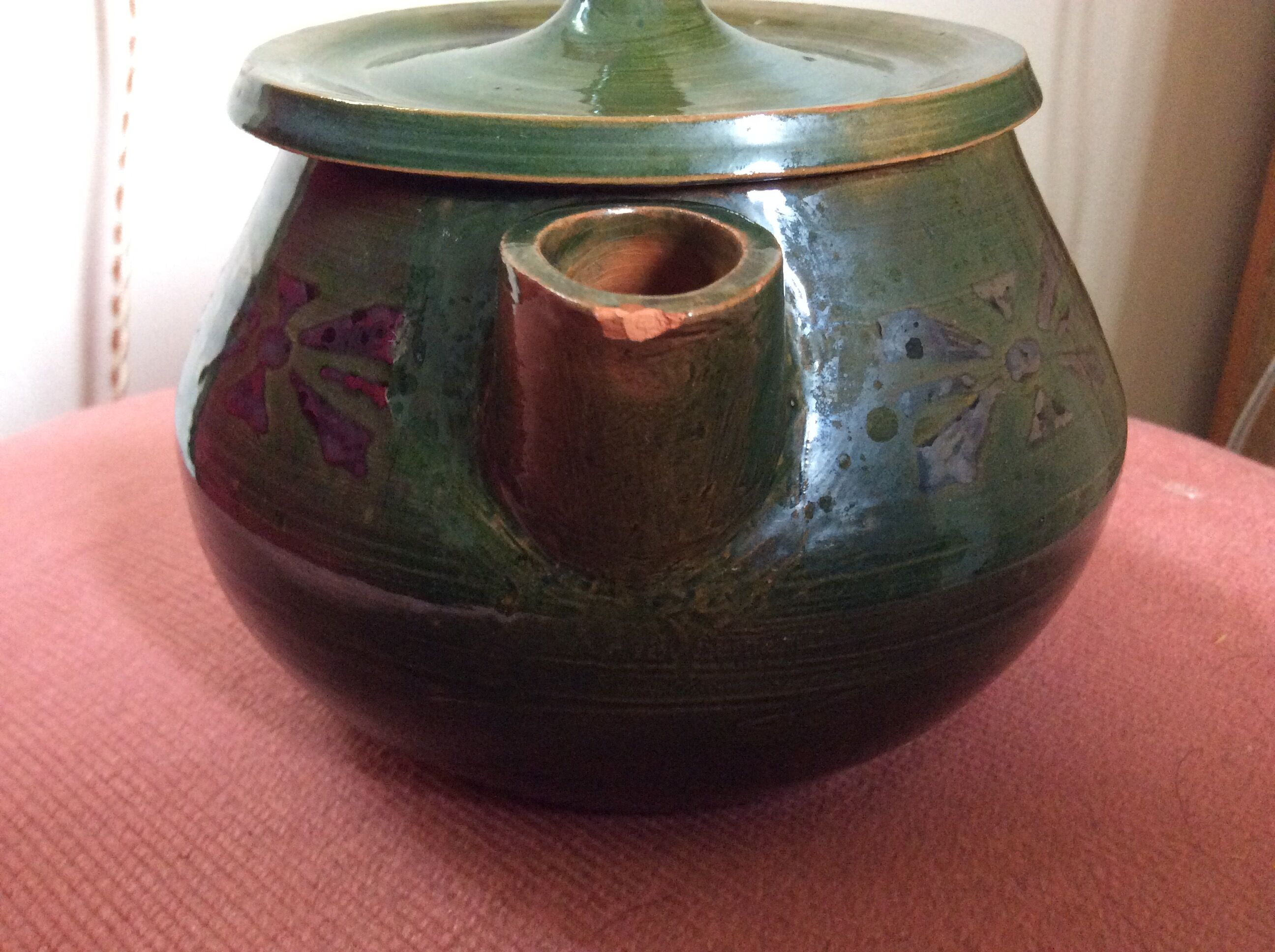 Glazed terracotta teapot