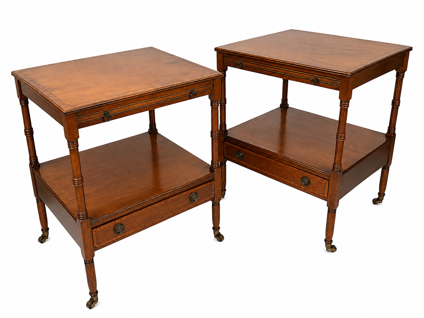 Pair of English mahogany side tables with sliding shelf.