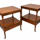 Pair of English mahogany side tables with sliding shelf.