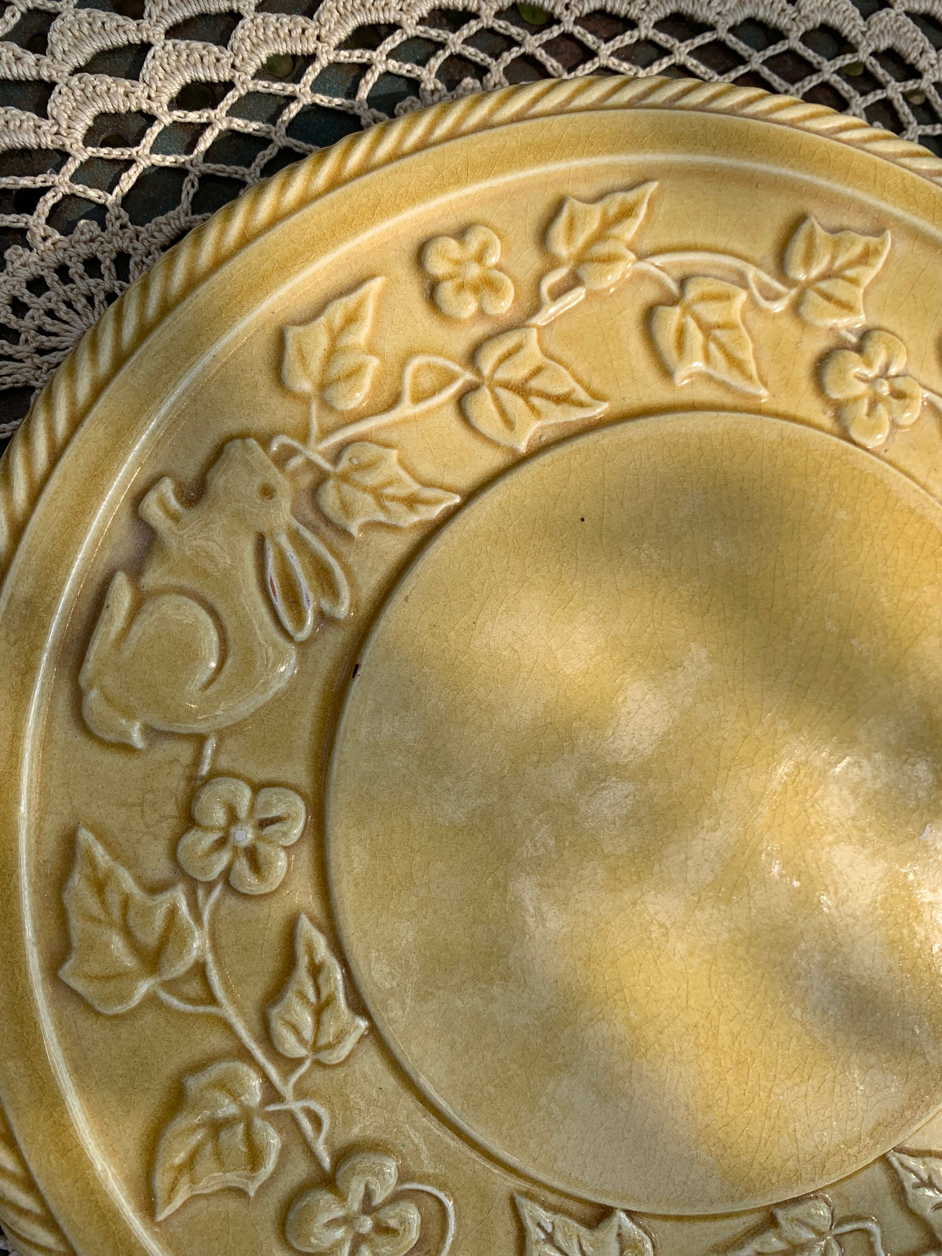 Underside, glazed ceramic, slurry, ivy frieze and rabbit pattern, Vintage