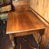 Louis XIII writing table in walnut, turned baluster x-shaped legs.