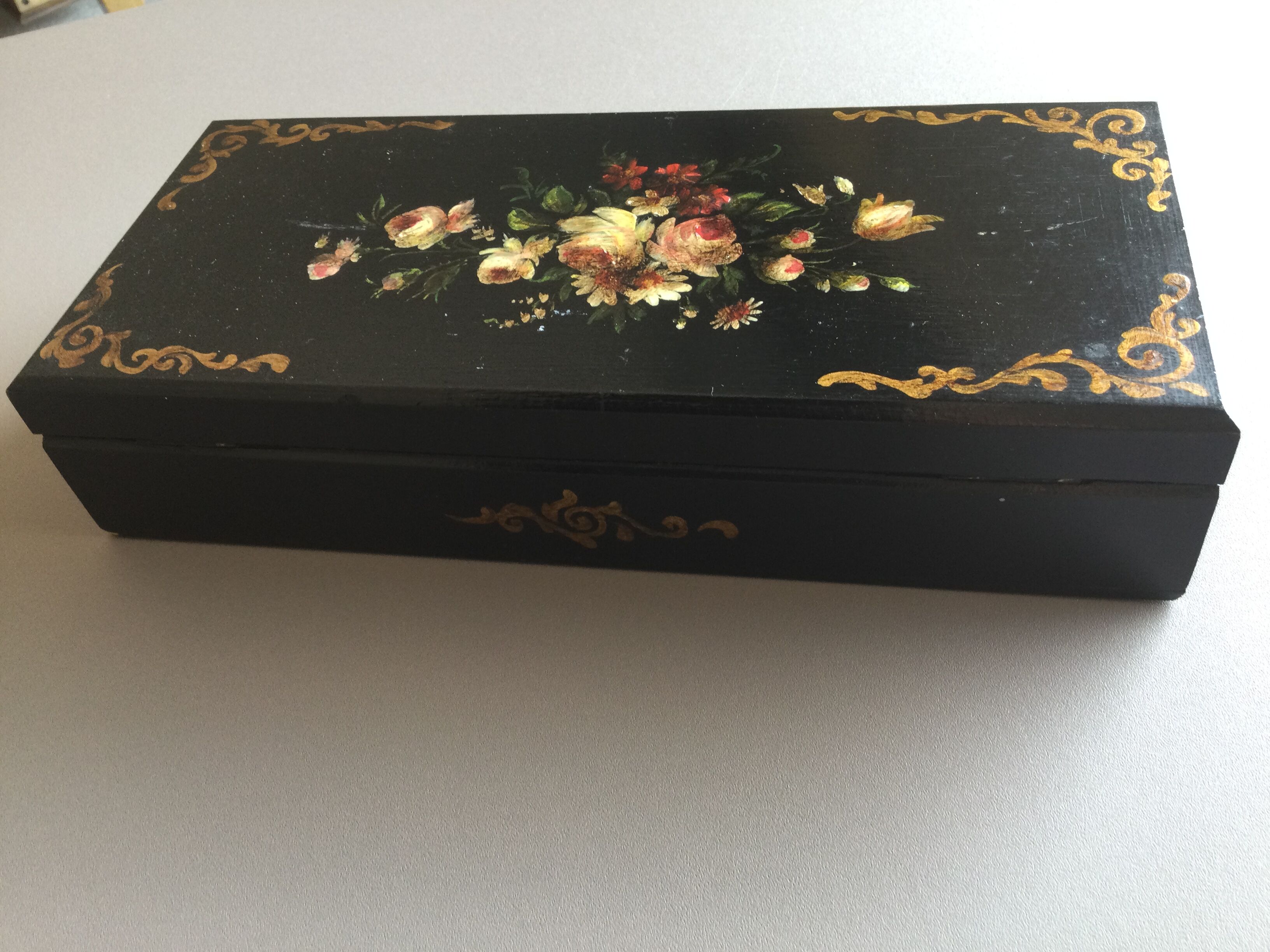 Black, hand-painted vintage jewellery box