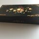 Black, hand-painted vintage jewellery box