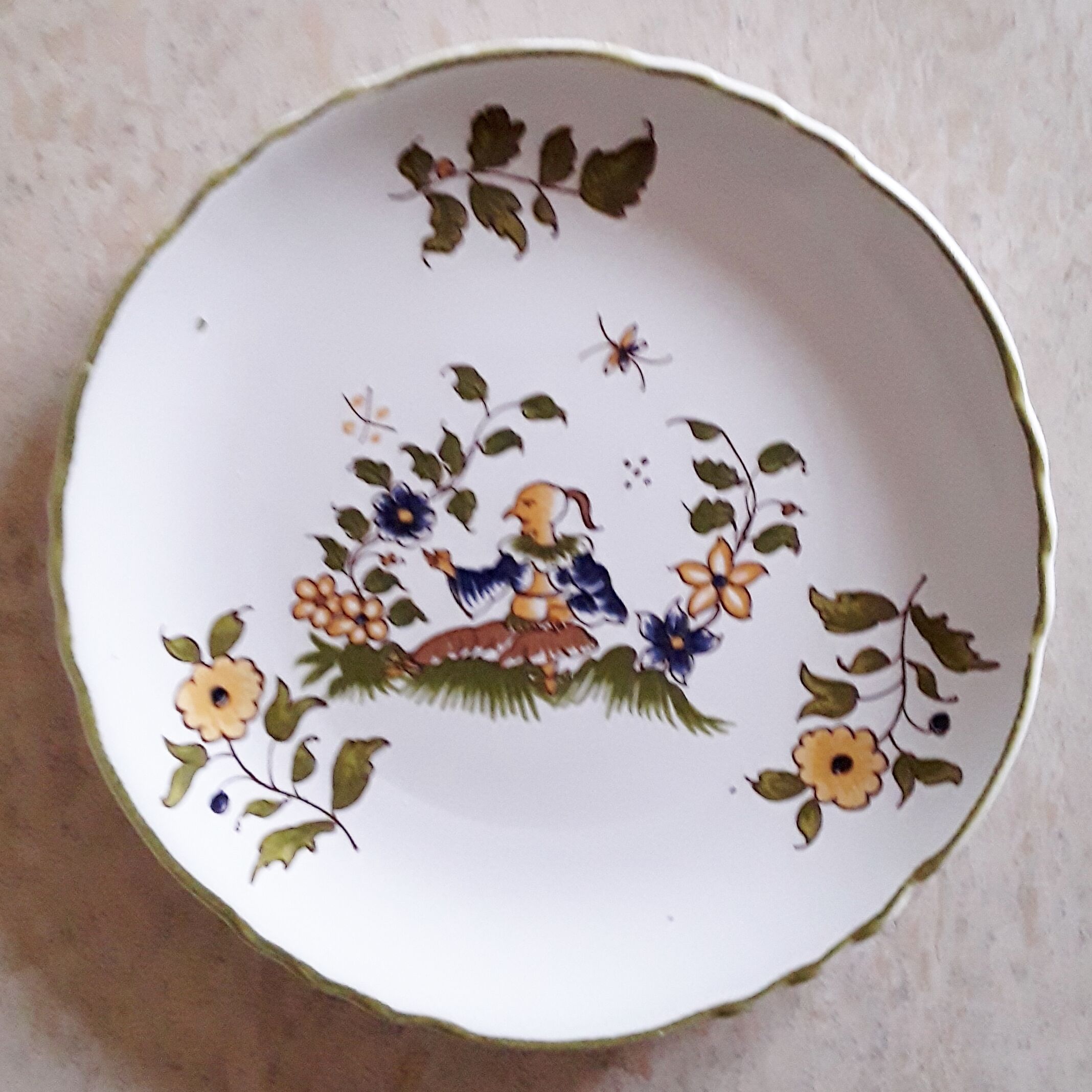 Lot of three small dessert plates decorated "Moustiers"