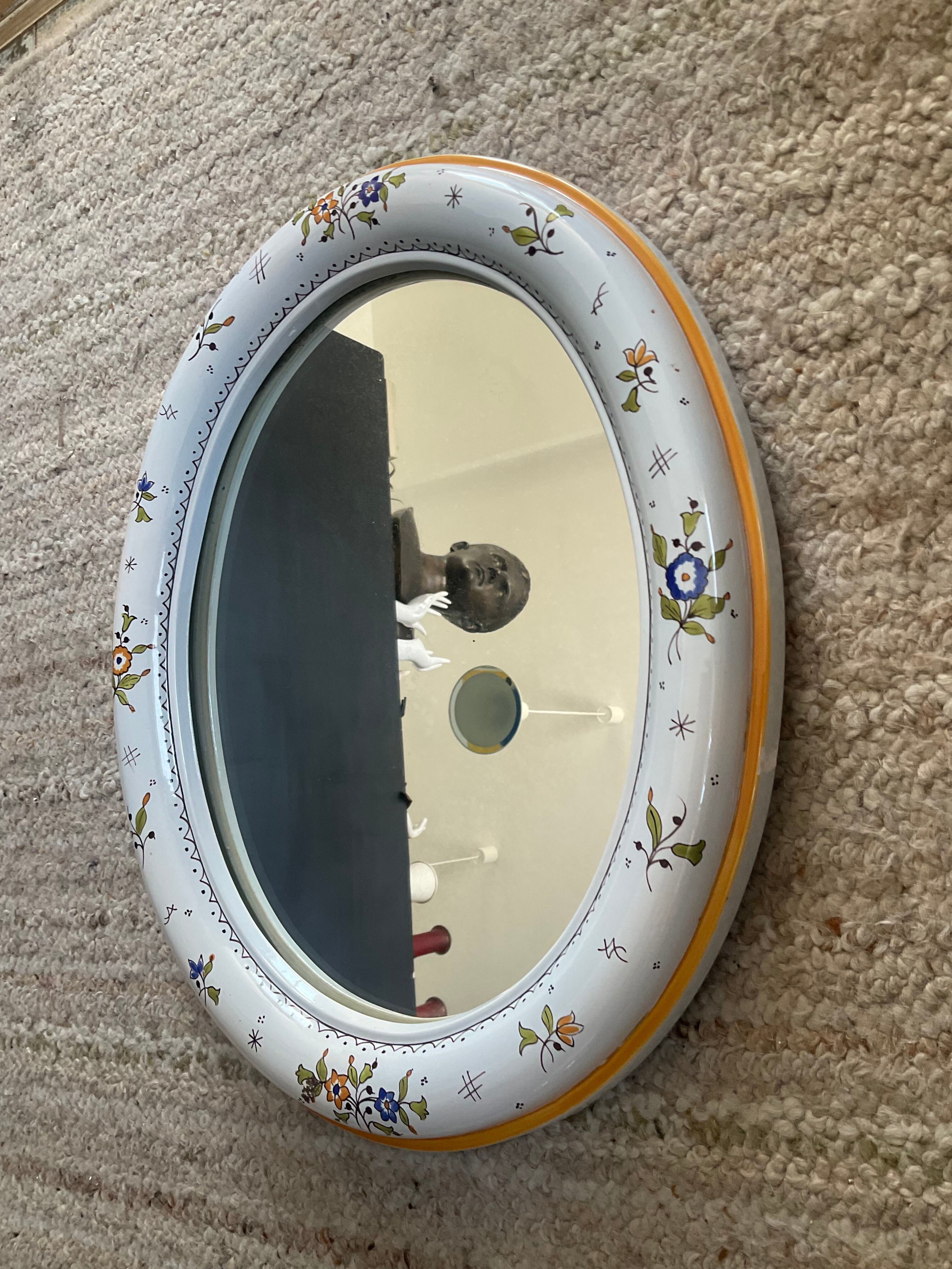 Vintage oval mirror in glazed earthenware
