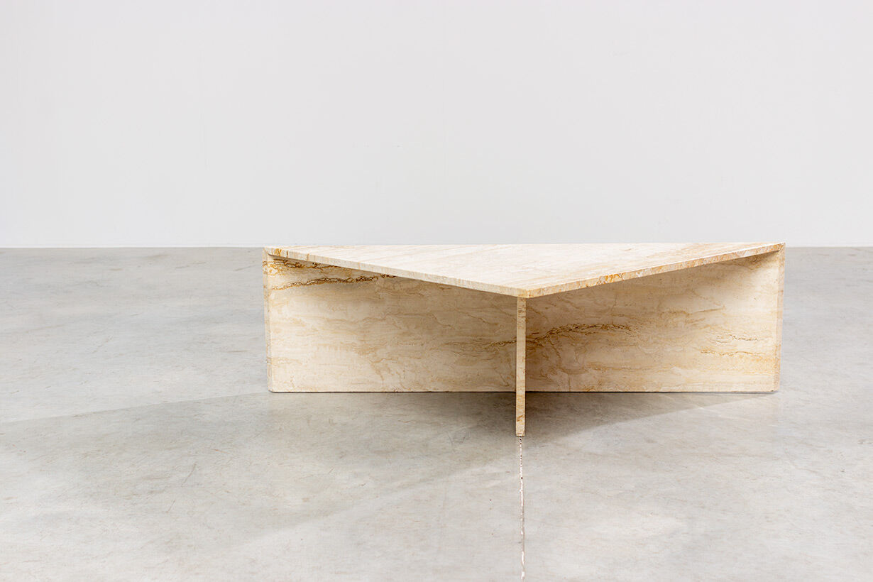 Triangular travertine lounge table around 1970 on the modernism