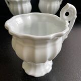 Set of 4 white porcelain teacups