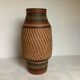 Terracotta vase homvombeit