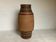 Terracotta vase homvombeit