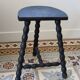 Antique tripod stool in turned wood, painted black – Half-moon seat
