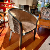 Pair of Art Deco barrel chairs in black and bronze