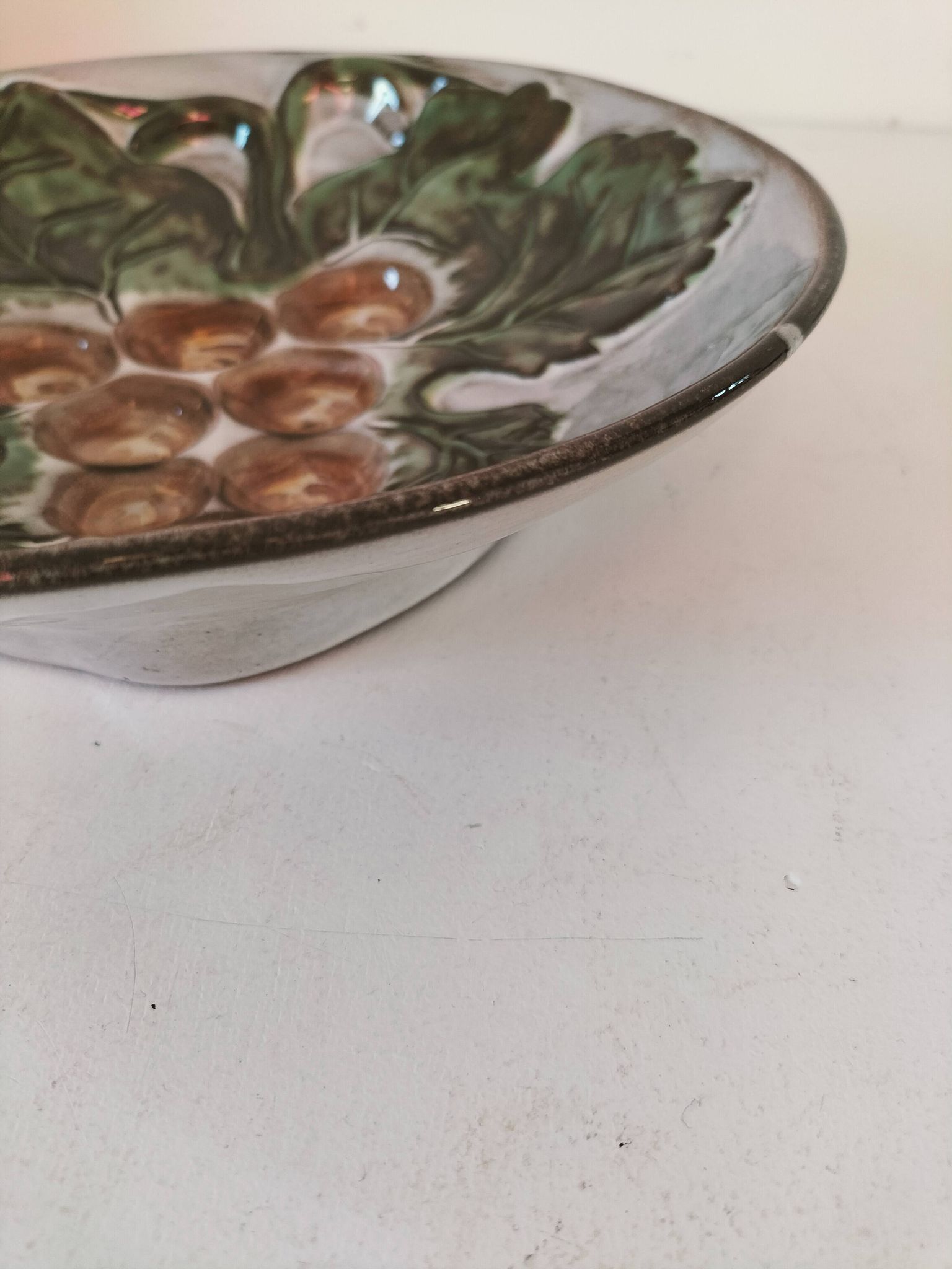 Vintage ceramic bowl – embossed grape pattern in slip style