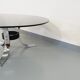 Vintage round coffee table in glass, chromed metal and black metal Space Age style of the 70s