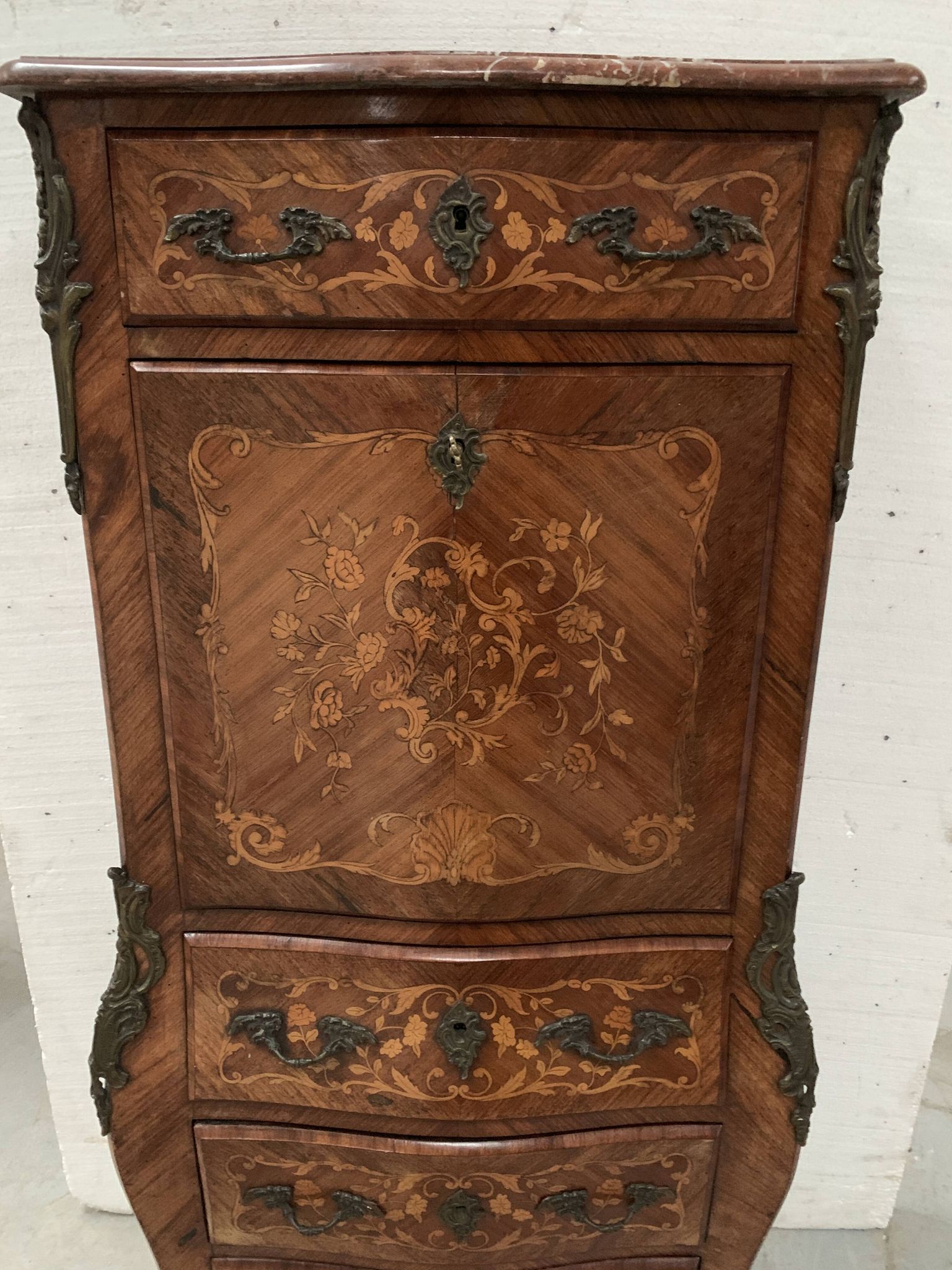 Louis XV style lady's secretary in light wood marquetry, 20th century.