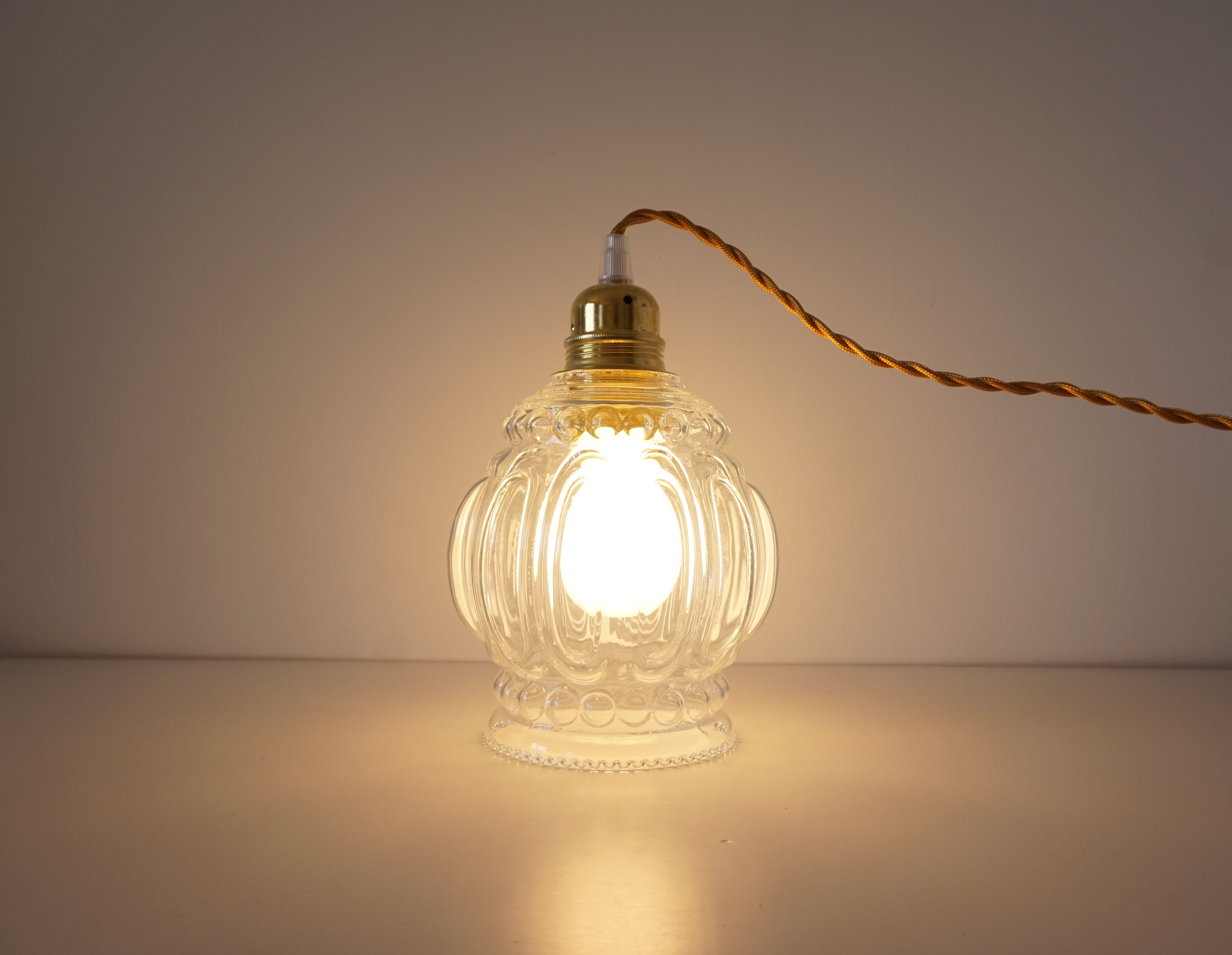 Suspension molded glass globe player