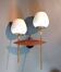 Two-light wall lamp in teak, gilded brass and white opaline Maison Lunel 1960.