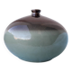 Green and brown ceramic vase