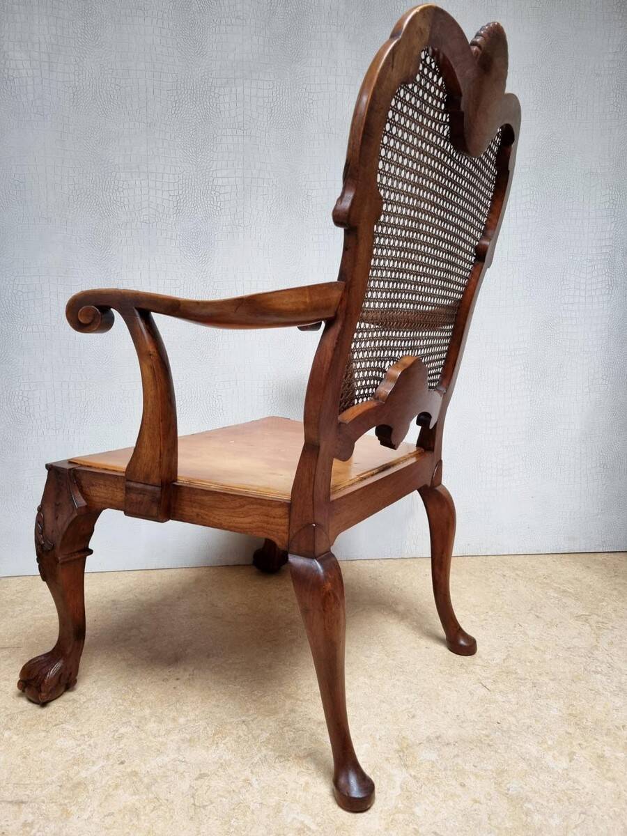 Chippendale Bergere Armchair, Carved Mahogany with Cane and Lion Claw Ball