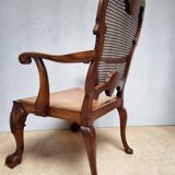 Chippendale Bergere Armchair, Carved Mahogany with Cane and Lion Claw Ball