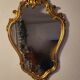 Miroir en bois d'or à  l or,style Louis 15