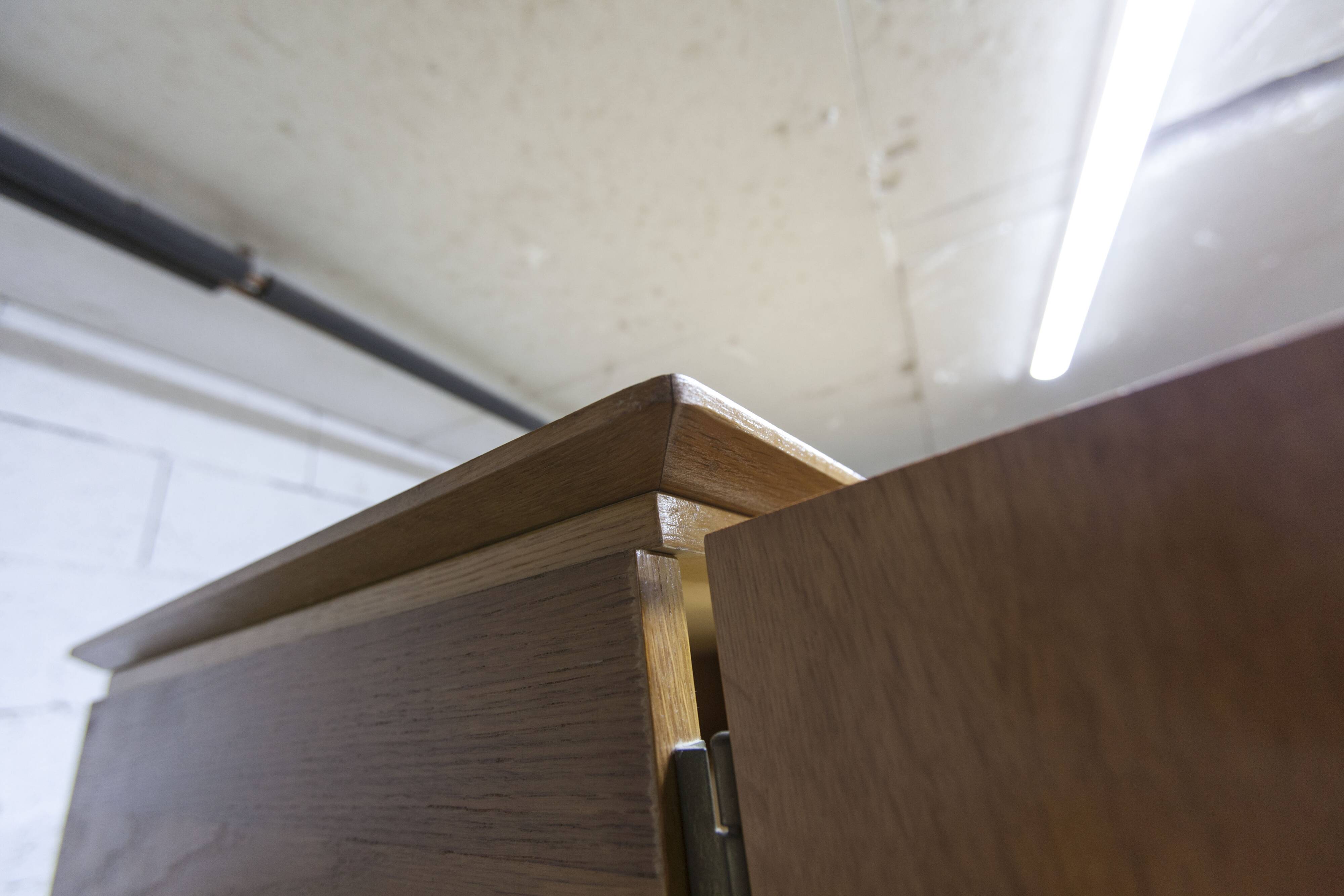 French wardrobe with tapered legs, 3 doors, 1 mirror (27*130), and 1 drawer.