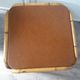 Rattan coffee table with brown leather top 63 cm side 39 cm high
