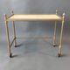 Neoclassical nesting trolleys in gilded brass and peach marble 1950/1960.