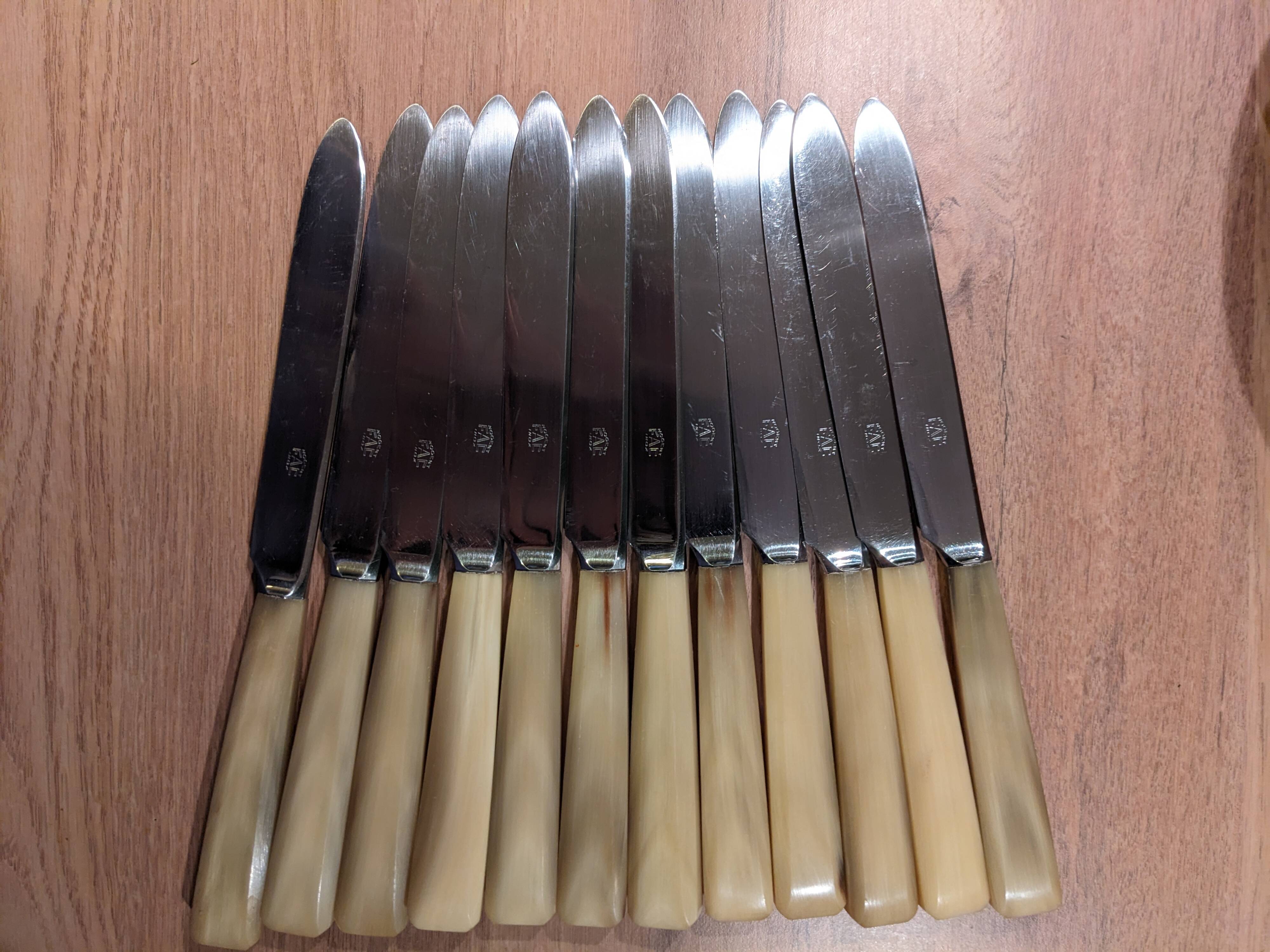 Set of 25 horn and stainless steel knives