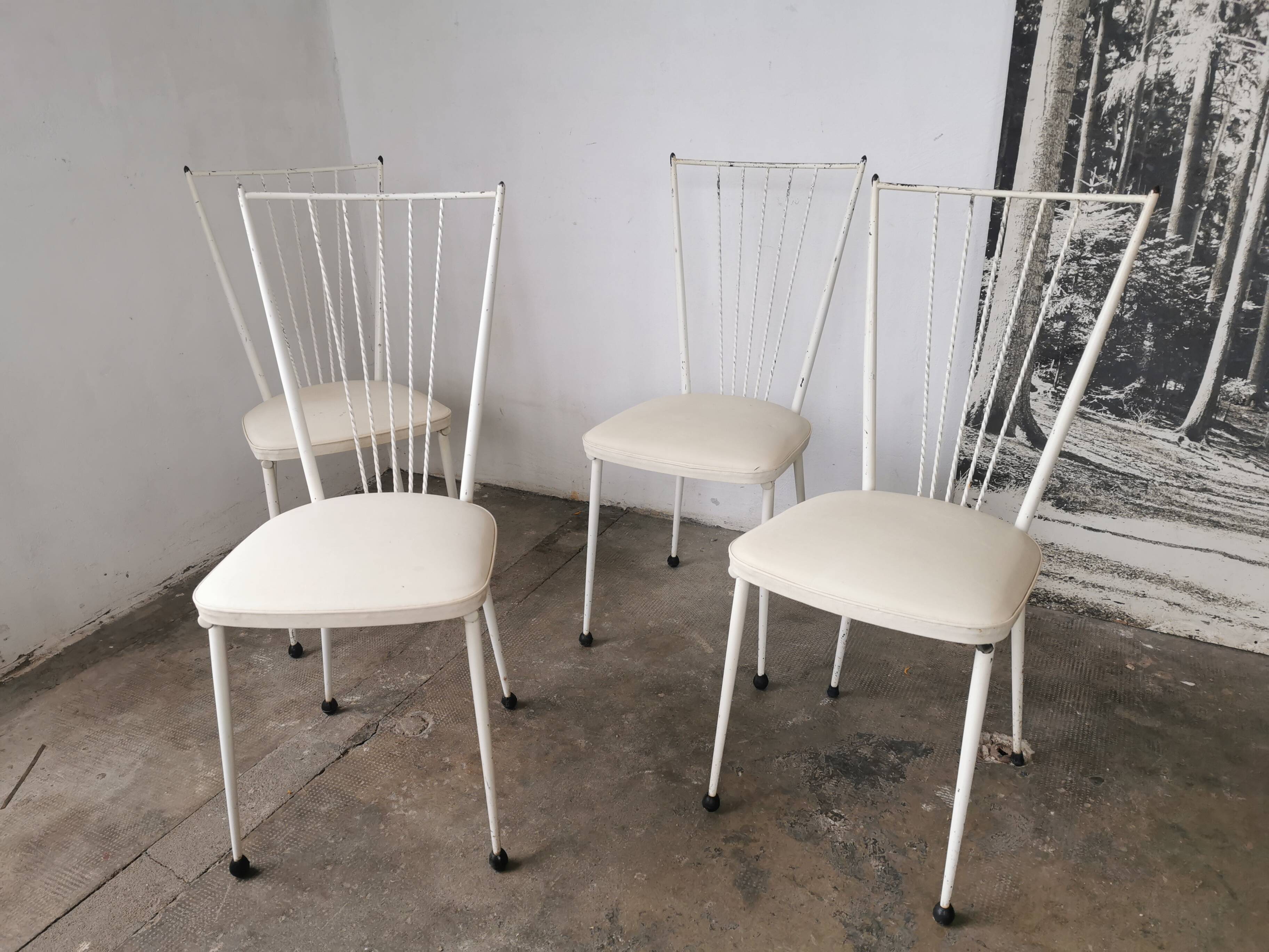 Set of 4 vintage chairs in metal and Skai