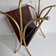 Vintage magazines and gold and leather brass