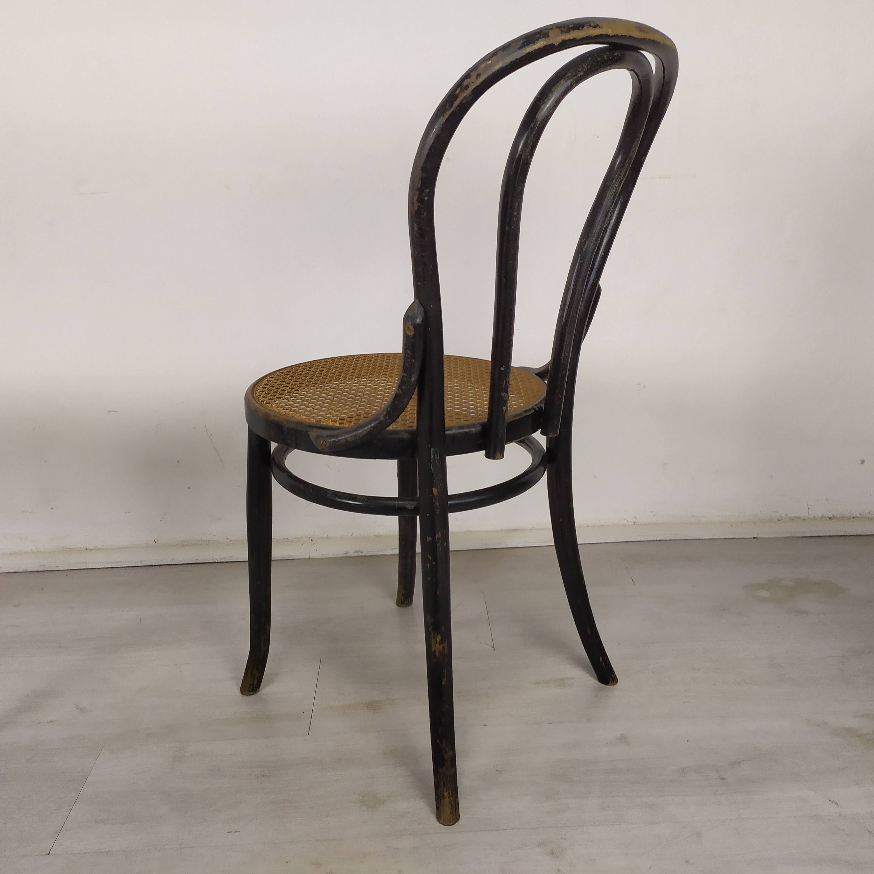 Black canned bistro chairs