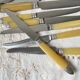 12 couteaux vintage bakélite Inox Pradel