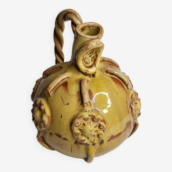 Old “watering can” jug in yellow ocher enameled ceramic, signed Meyssac Corrèze, 24 cm