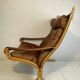 Belle chaise vintage Westnofa modèle Siesta par Ingmar Relling. Chaise Siësta en cuir. Belle patine.