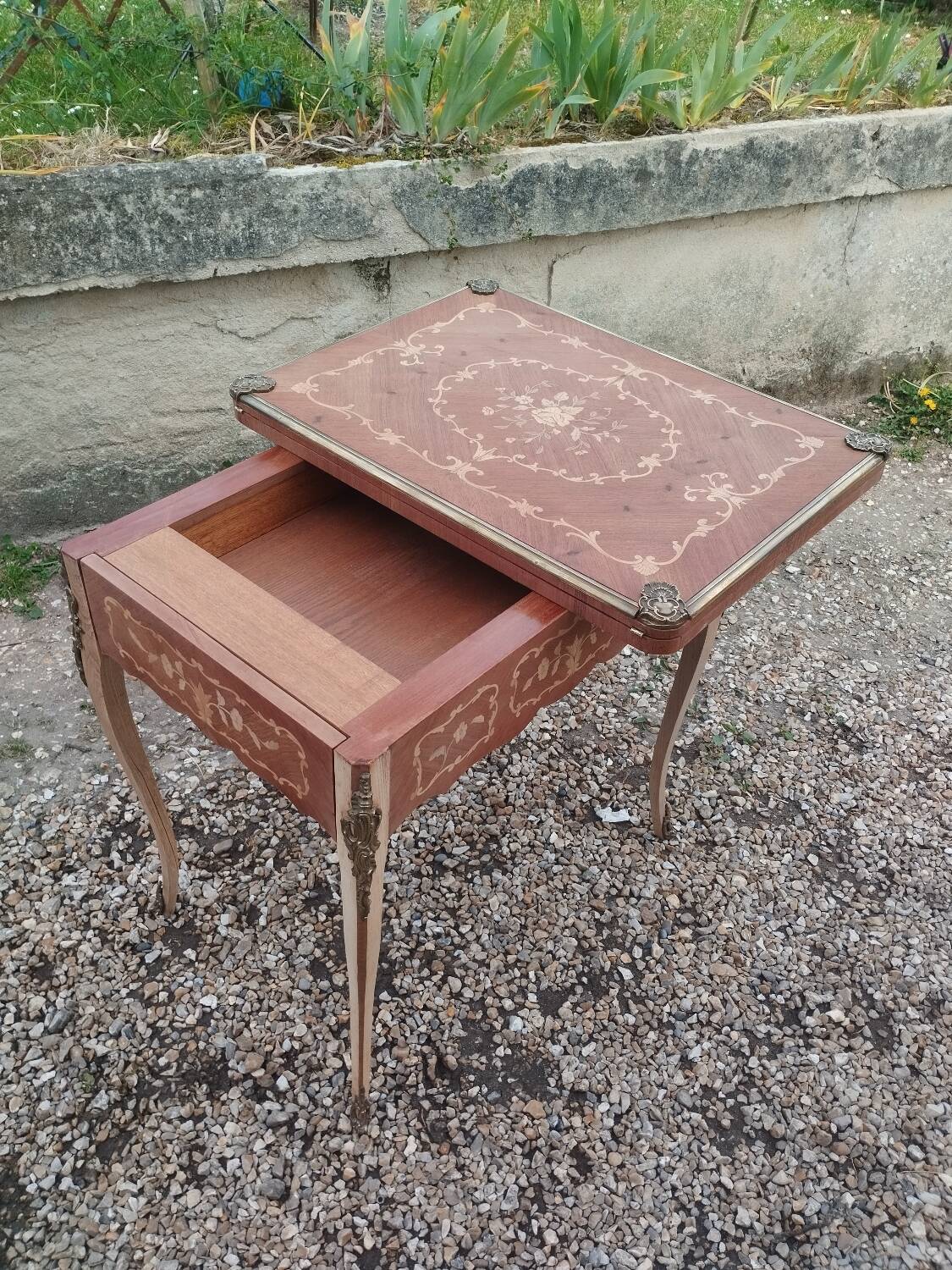 Antique game table in Louis XVI style with marquetry.